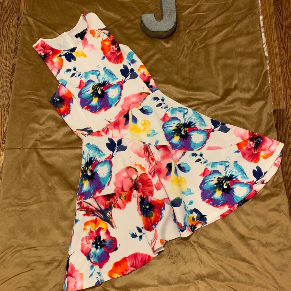 Aqua dress with flower print, great for honeymoon